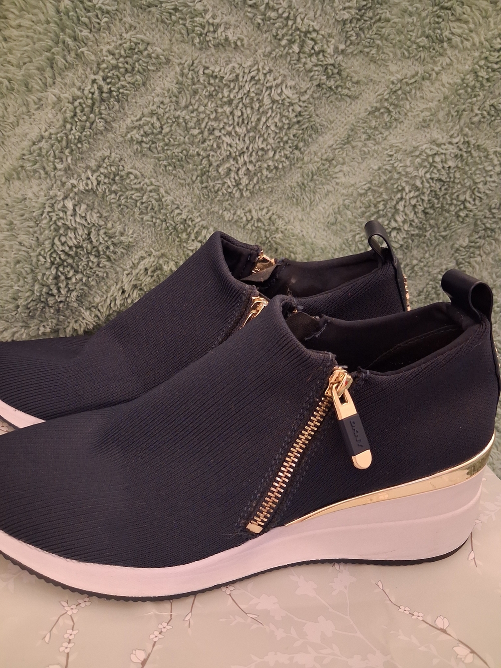 DKNY Women's Black Slip-On Wedge Sneakers with Gold Accent